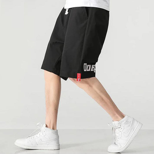 Summer new men's Korean version loose thin section letter printing sports casual five-point pants trend couple short pants 
