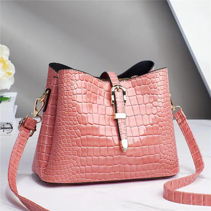 Factory bag 2022 new women's bag European and American cross-border trend texture bright leather stone pattern one-shoulder cross-body bucket bag 