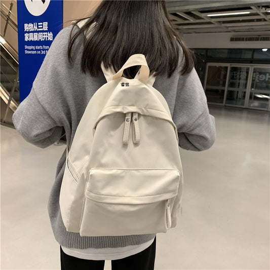 Simple and versatile solid color backpack for women's college birthday, college style school bag, female forest style middle school student trendy backpack 