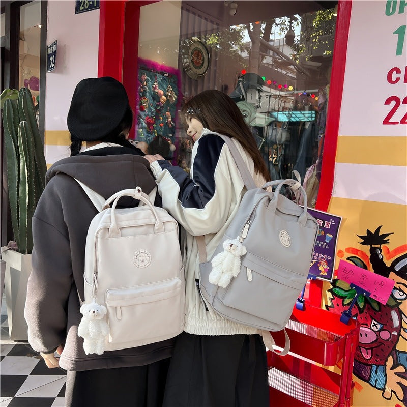 Japanese ins girl backpack Korean version junior high school student school bag female trendy large capacity solid color nylon handbag 