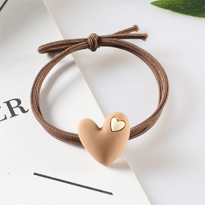 Korean version of popular peach heart milk tea color head rope female hair rope tie hair adult student hair ring heart-shaped rubber band headdress 
