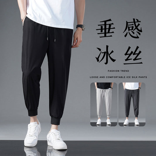 Enbu summer new Korean version of loose ice silk thin section solid color nine-point pants trend couple models bundled feet harem pants 