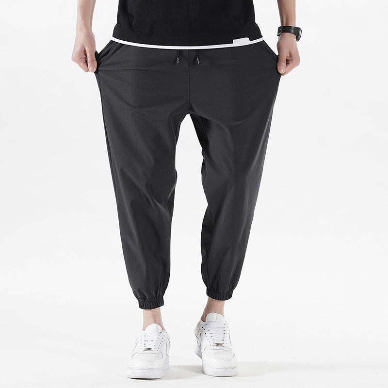Enbu summer new men's Korean version loose ice silk thin section solid color casual sports nine-point pants trendy couple pants 
