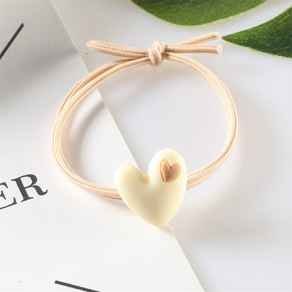 Korean version of popular peach heart milk tea color head rope female hair rope tie hair adult student hair ring heart-shaped rubber band headdress 