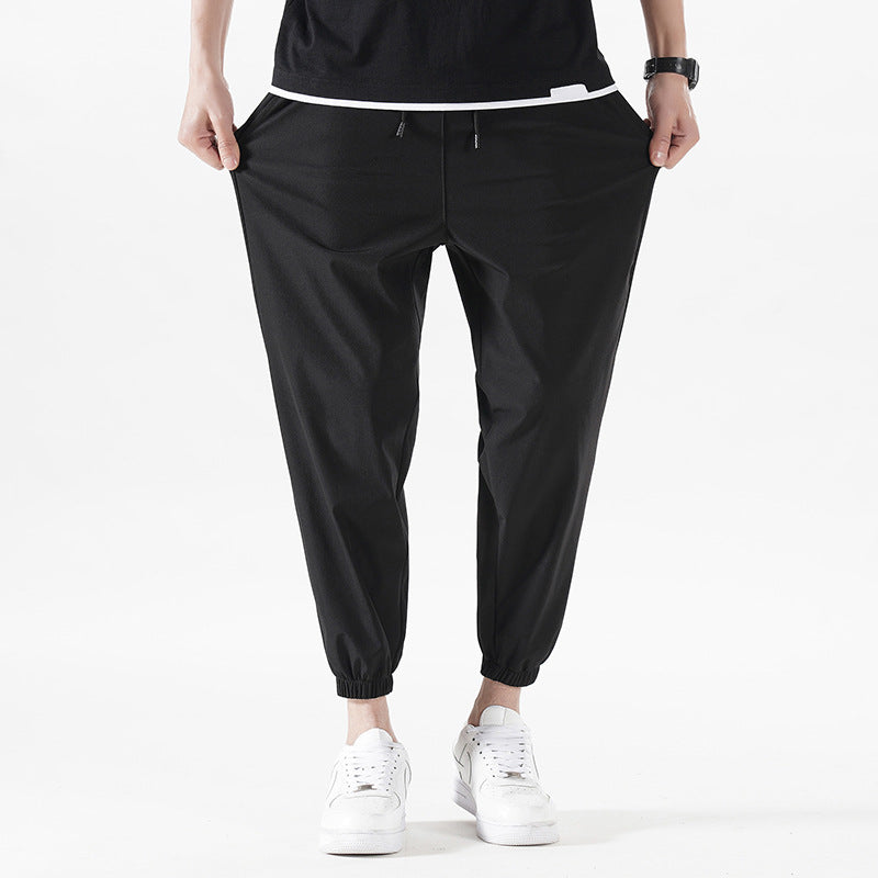 Enbu summer new men's Korean version loose ice silk thin section solid color casual sports nine-point pants trendy couple pants 