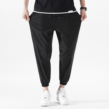 Enbu summer new men's Korean version loose ice silk thin section solid color casual sports nine-point pants trendy couple pants 