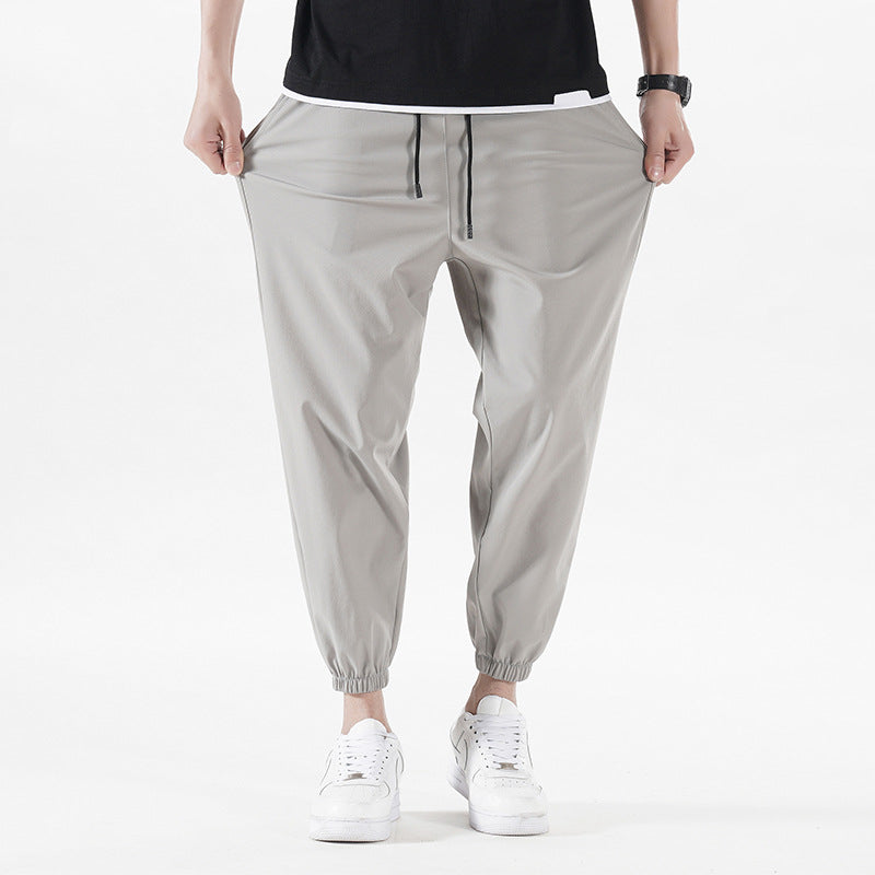 Enbu summer new men's Korean version loose ice silk thin section solid color casual sports nine-point pants trendy couple pants 