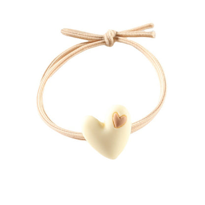 Korean version of popular peach heart milk tea color head rope female hair rope tie hair adult student hair ring heart-shaped rubber band headdress 