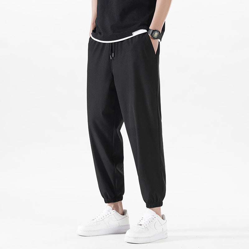 Enbu summer new men's Korean version loose ice silk thin section solid color casual sports nine-point pants trendy couple pants 