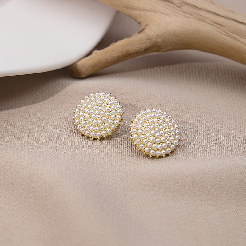 Japanese and Korean diamond-encrusted geometric earrings niche light luxury high-end pearl oil dripping bow earrings wholesale 