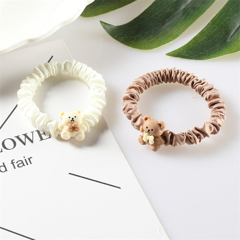 နို့လက်ဖက်ရည်ရောင် ဆံပင်ကြိုး Korean version ကာတွန်း လေးစွပ် ဝက်ဝံခေါင်းကြိုး အူစက်ဝိုင်း ဆံပင်ဆက်စပ်ပစ္စည်းများ ဦးခေါင်းကြိုး နှစ်ယွမ် စတိုးဆိုင် ထောက်ပံ့ရေး လက္ကား